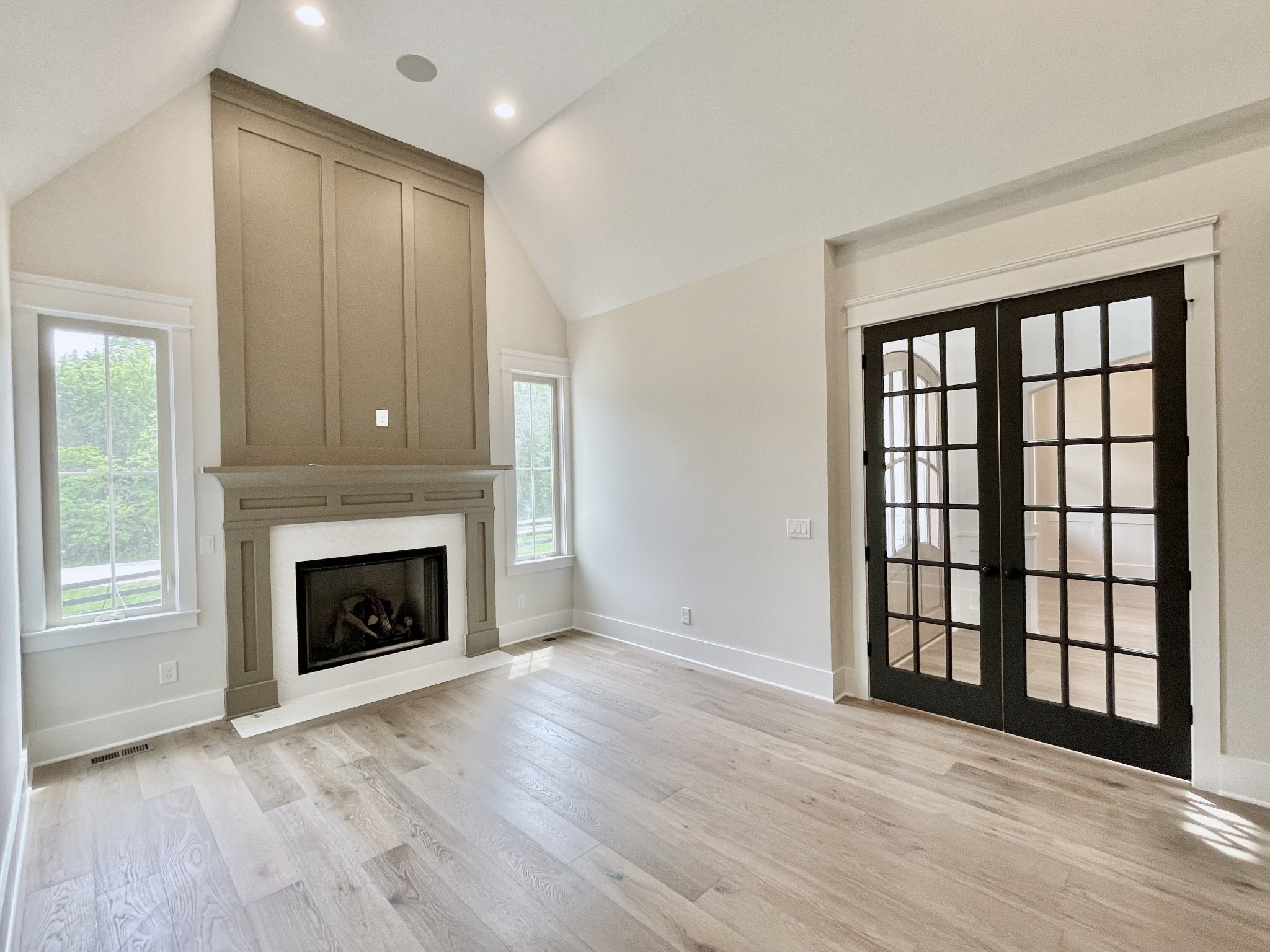 9926 Maupin Road Brentwood, TN 37027 - Photo 5 of 88 wooden floor fireplace and windows in an empty room