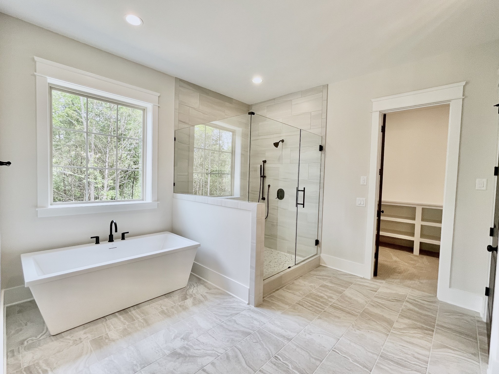 9926 Maupin Road Brentwood, TN 37027 - Photo 52 of 88 a spacious bathroom with a tub shower and sink