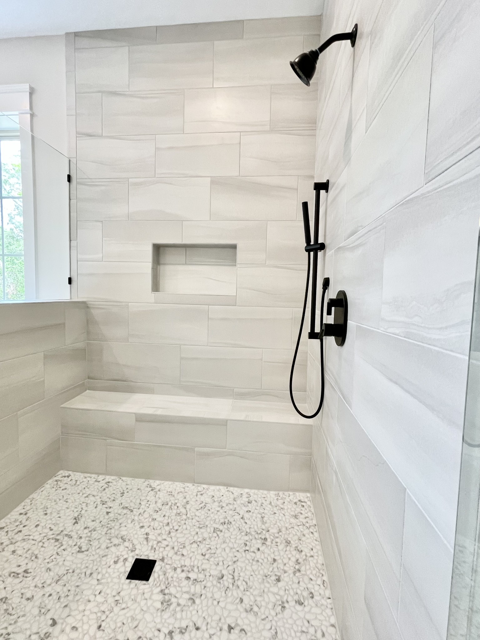 9926 Maupin Road Brentwood, TN 37027 - Photo 57 of 88 a bathroom with a glass shower door