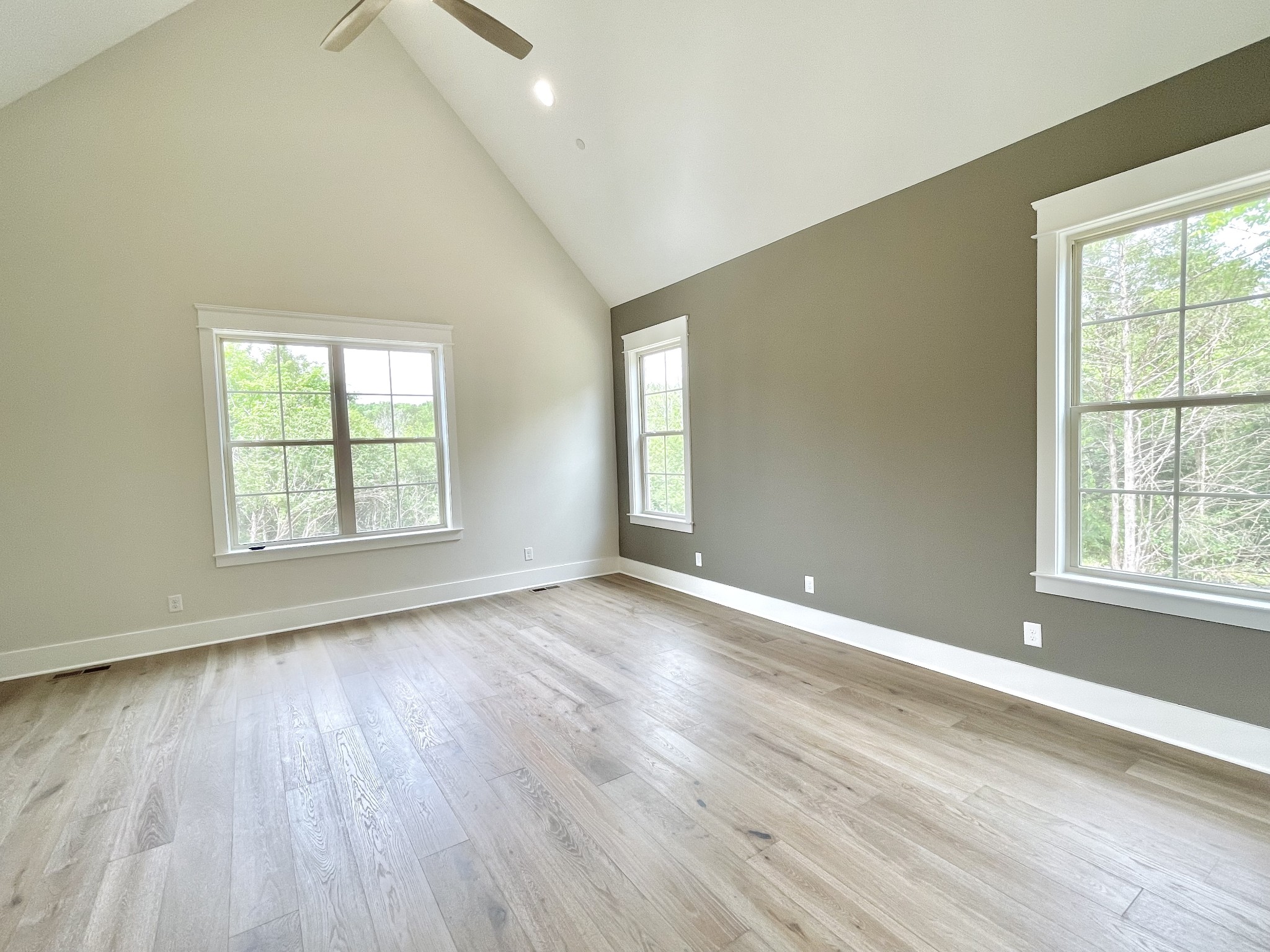 9926 Maupin Road Brentwood, TN 37027 - Photo 59 of 88 an empty room with wooden floor and windows
