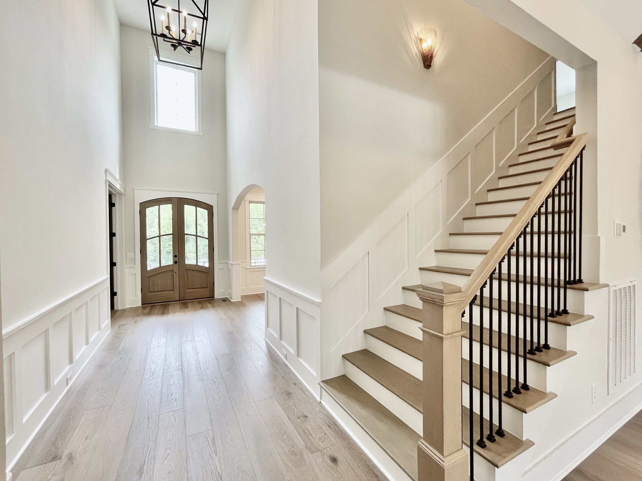 9926 Maupin Road Brentwood, TN 37027 - Photo 60 of 88 a view of staircase with wooden floor and a window