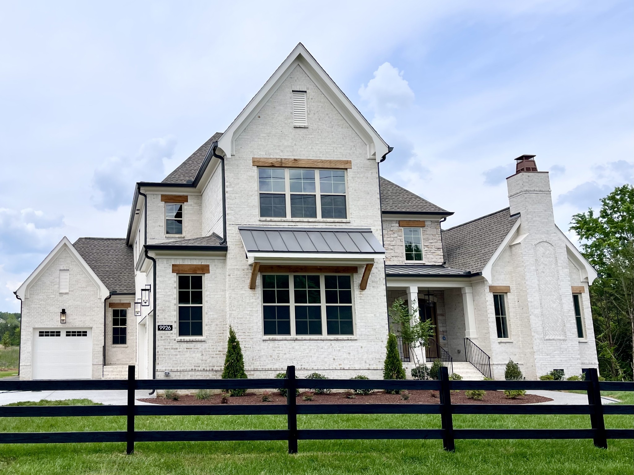 9926 Maupin Road Brentwood, TN 37027 - Photo 85 of 88 a front view of a house with a yard