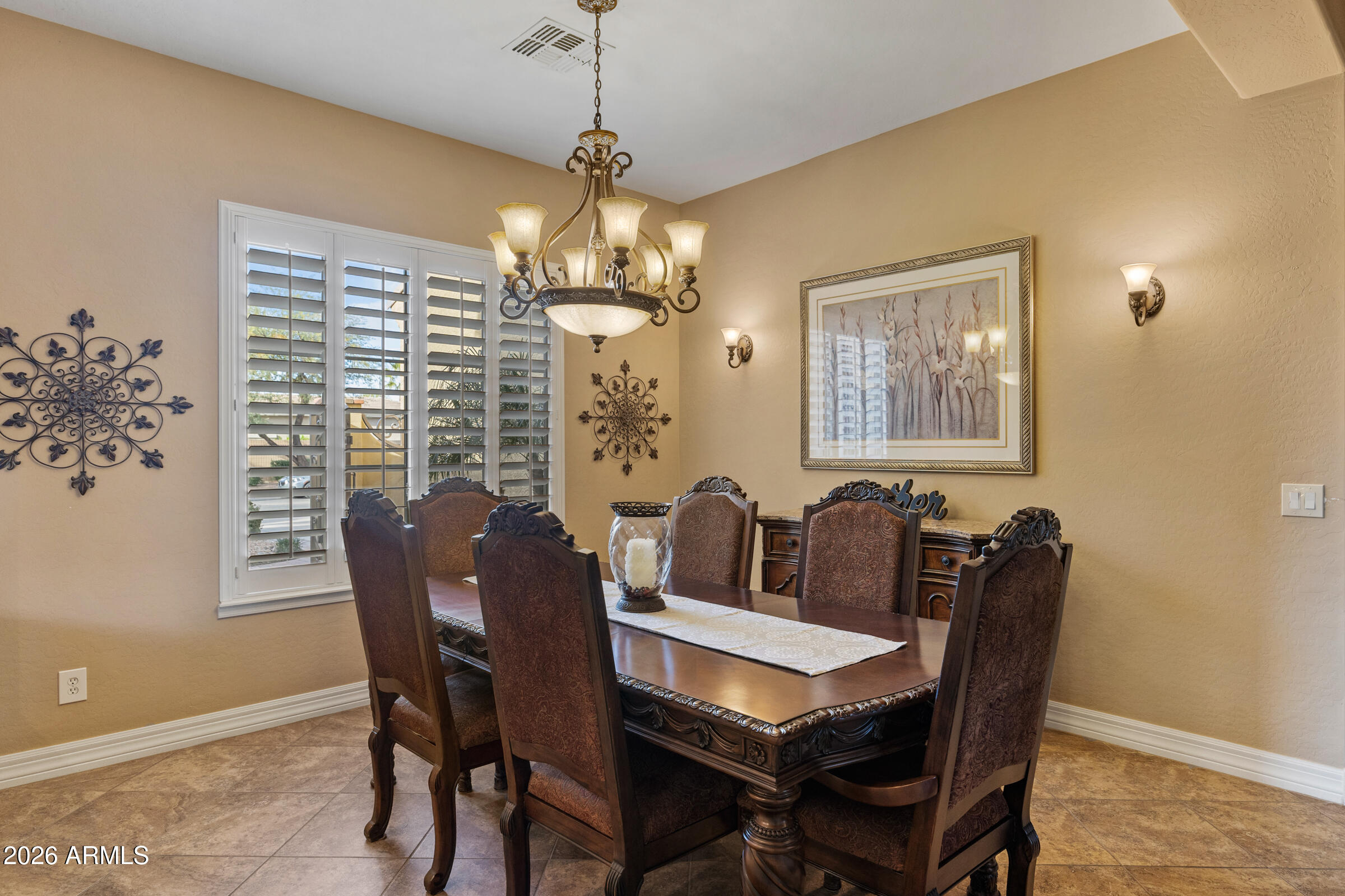 1341 East Macaw Court Gilbert, AZ 85297 - Photo 20 of 49 a view of a dining room with furniture window and outside view