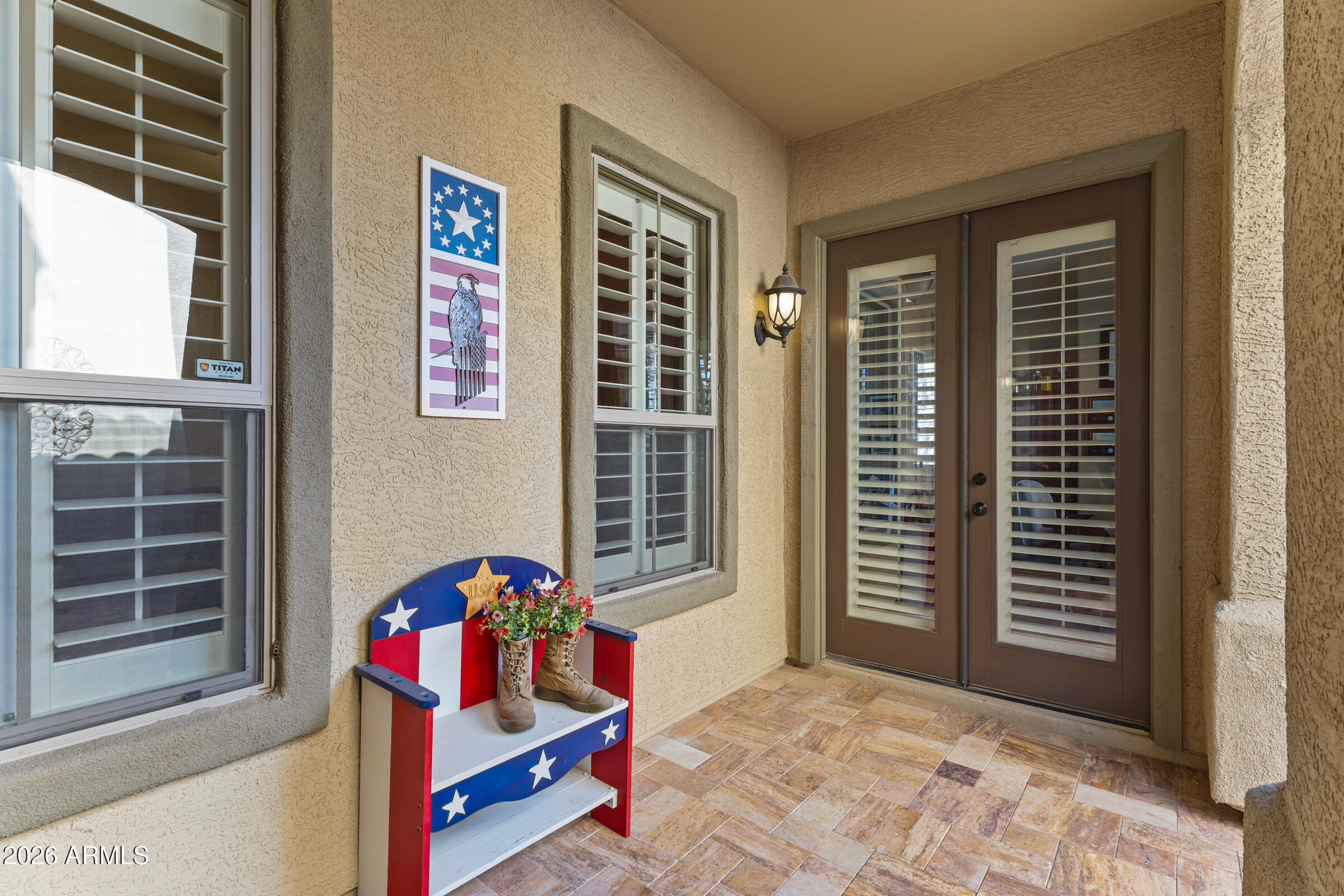 1341 East Macaw Court Gilbert, AZ 85297 - Photo 37 of 49 a bedroom with furniture and a window