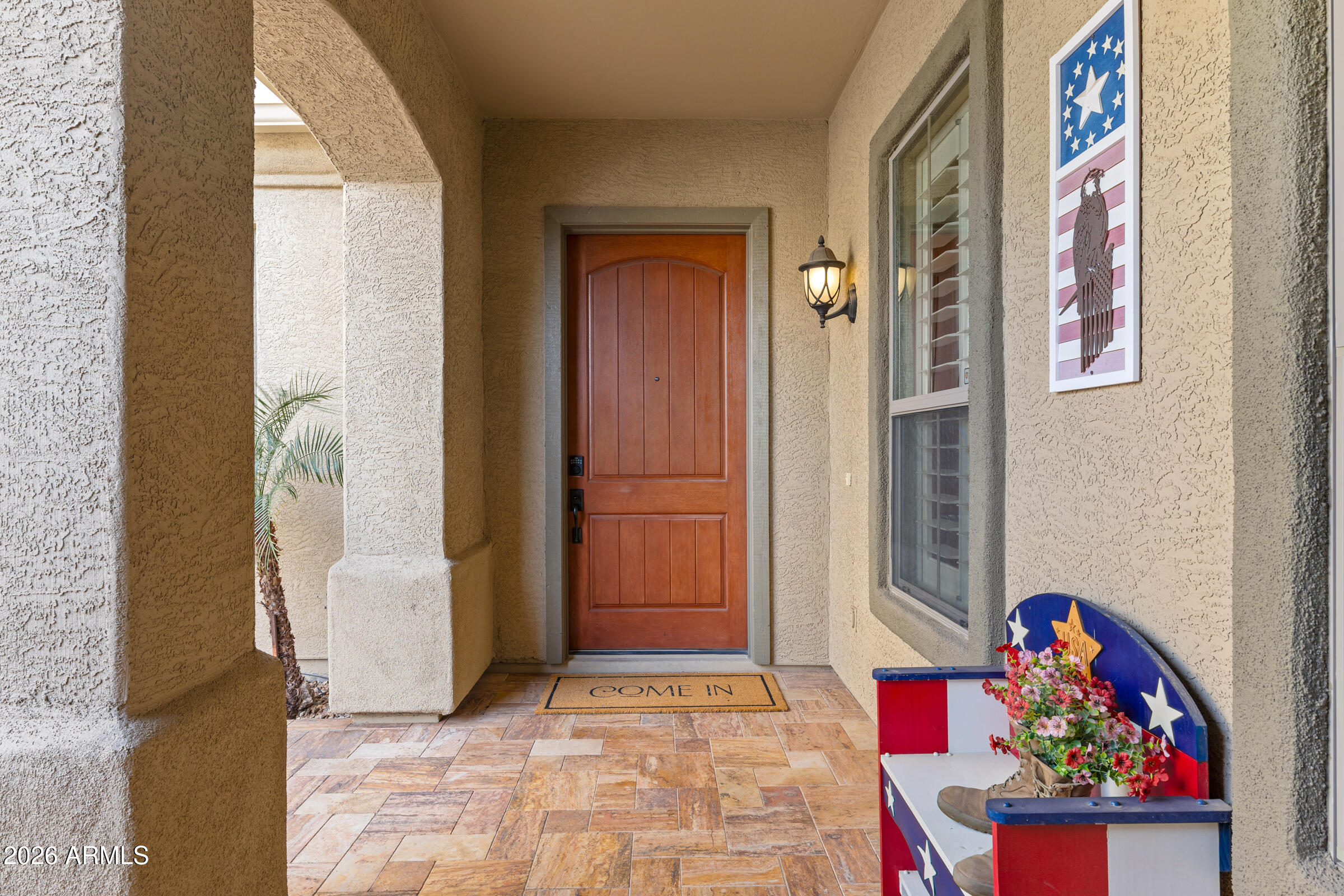 1341 East Macaw Court Gilbert, AZ 85297 - Photo 5 of 49 a view of an entryway with wooden floor