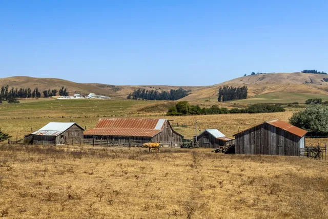a view of a town with an ocean beach
