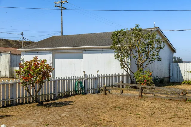 a house view with a backyard space