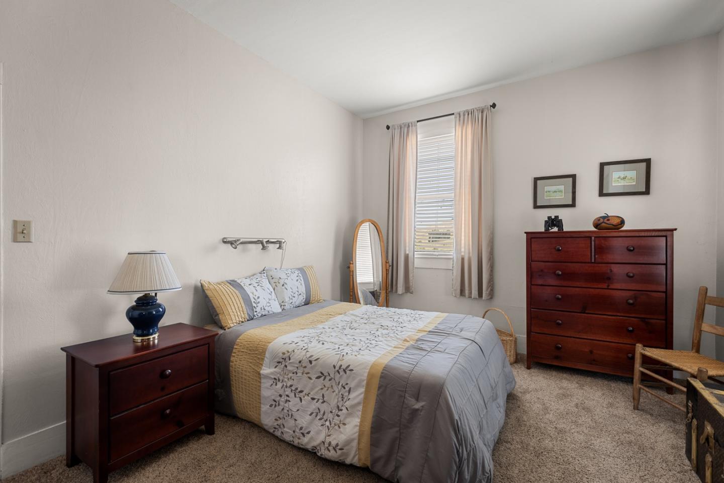 14550 Valley Ford Estero Road Valley Ford, CA 94972 - Photo 25 of 41 a bedroom with a bed and a dresser