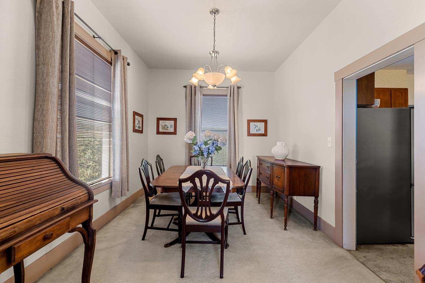 14550 Valley Ford Estero Road Valley Ford, CA 94972 - Photo 26 of 41 a view of a dining room with furniture window and wooden floor