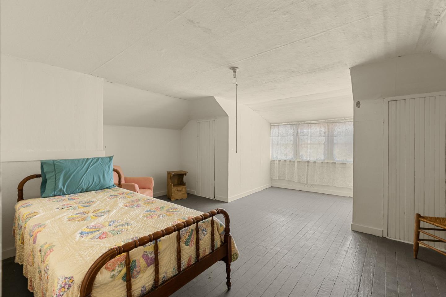 14550 Valley Ford Estero Road Valley Ford, CA 94972 - Photo 35 of 41 a bedroom with a bed and a window