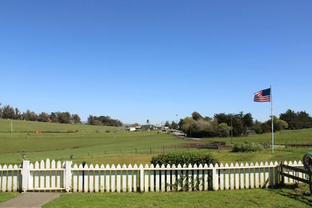 a view of a golf course with a lake
