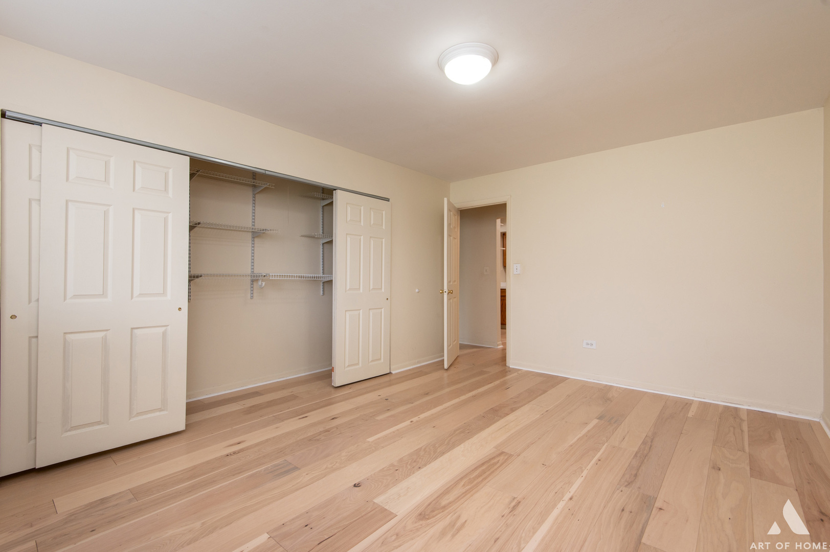 2214 South Goebbert Road, Unit 176 Arlington Heights, IL 60005 - Photo 13 of 19 a view of empty room with wooden floor
