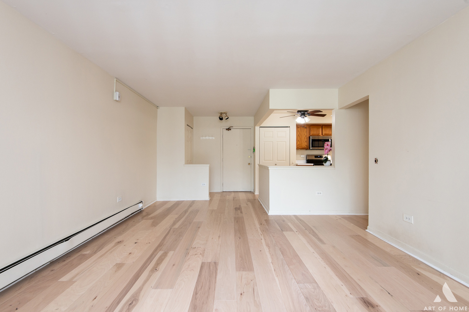 2214 South Goebbert Road, Unit 176 Arlington Heights, IL 60005 - Photo 8 of 19 a view of empty room with wooden floor