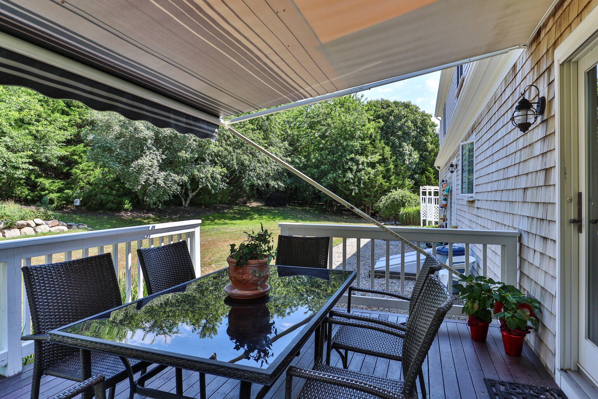 45 Briar Lane West Barnstable, MA 02668 - Photo 29 of 44 a view of balcony with furniture and trees