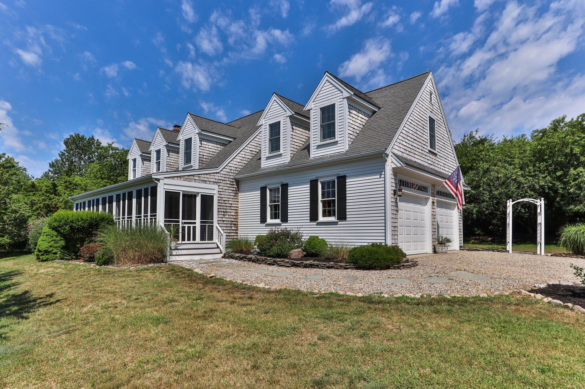 45 Briar Lane West Barnstable, MA 02668 - Photo 3 of 44 a front view of a house with a yard