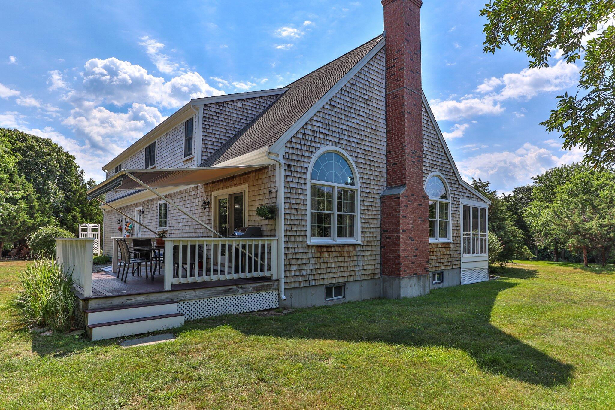45 Briar Lane West Barnstable, MA 02668 - Photo 31 of 44 a front view of a house with a garden