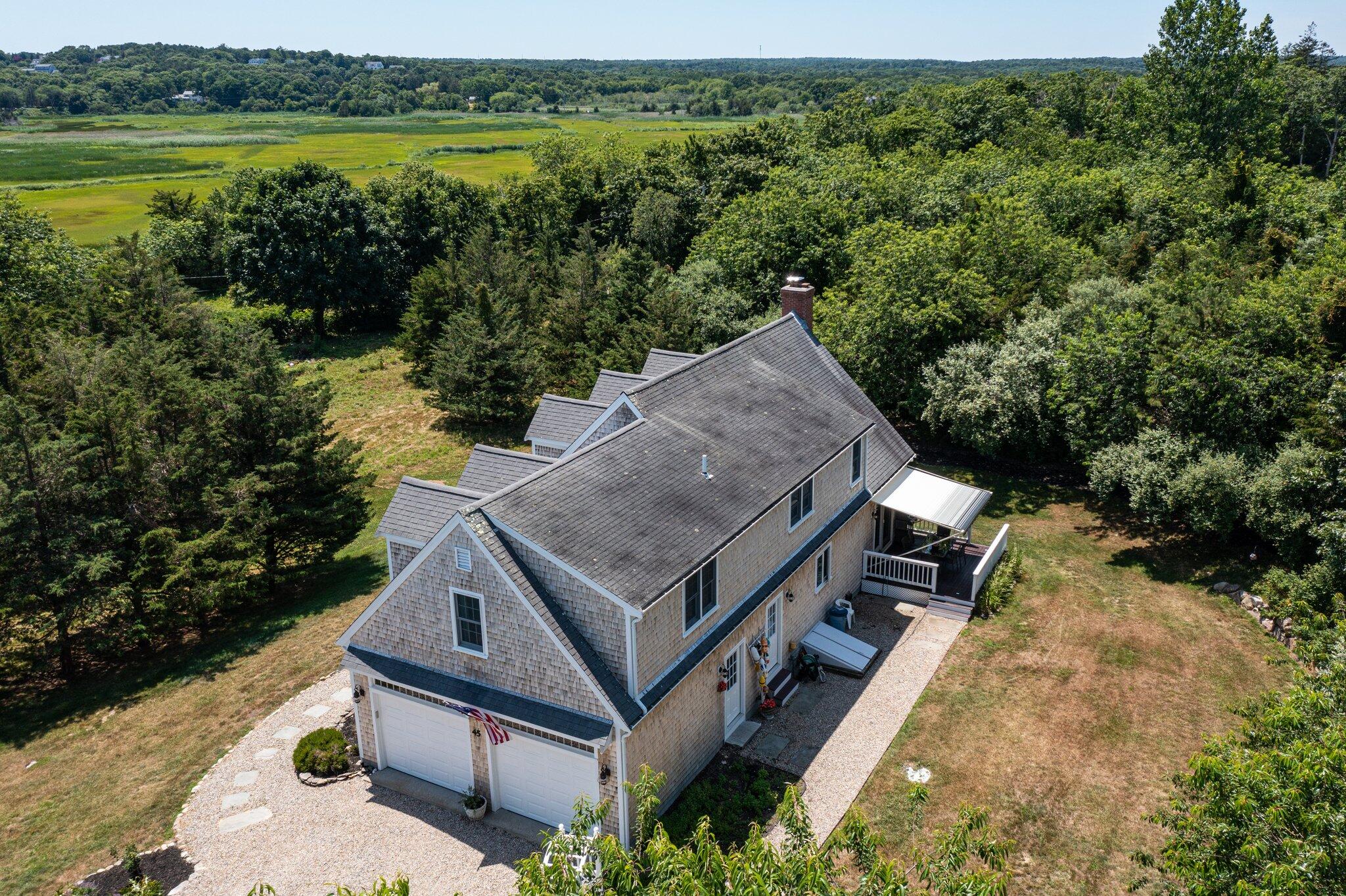 45 Briar Lane West Barnstable, MA 02668 - Photo 37 of 44 an aerial view of a house with a yard and lake view