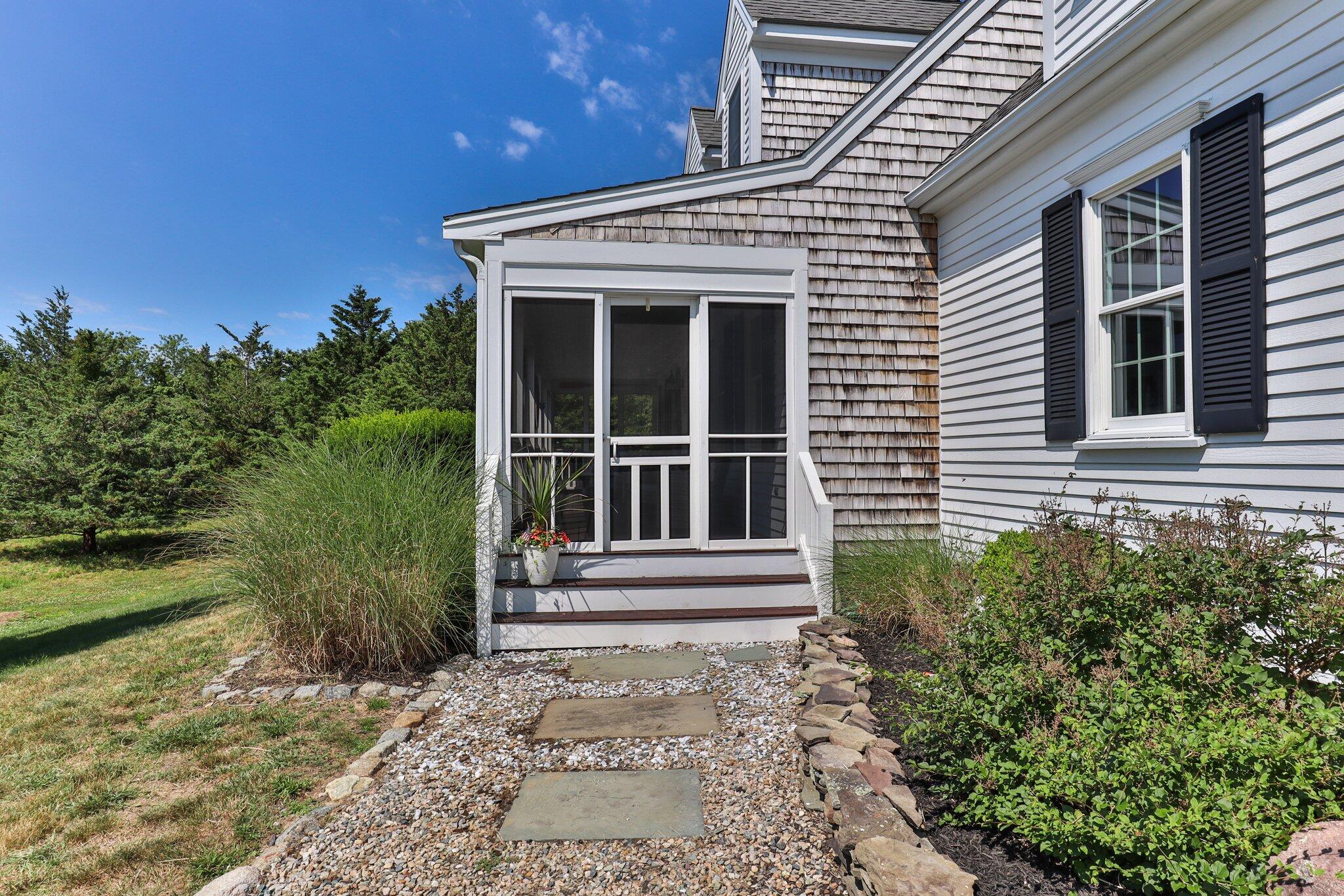45 Briar Lane West Barnstable, MA 02668 - Photo 4 of 44 a front view of a house with a garden