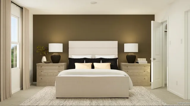 a bedroom with a bed and mirror