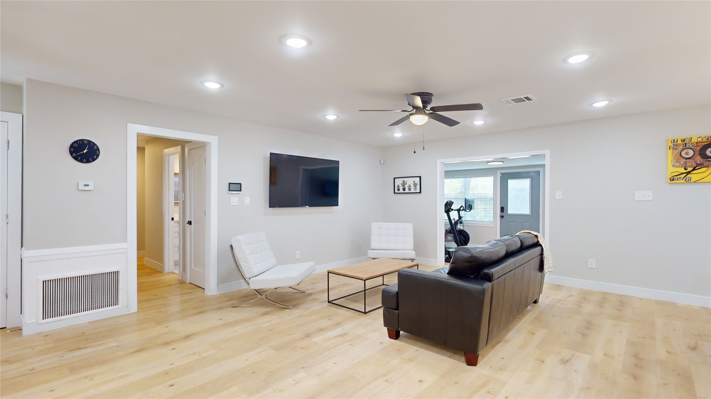 5455 Birdwood Road Houston, TX 77096 - Photo 6 of 26 a living room with furniture and a ceiling fan