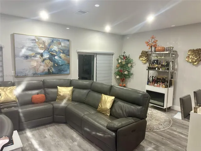 a living room with furniture and a couch