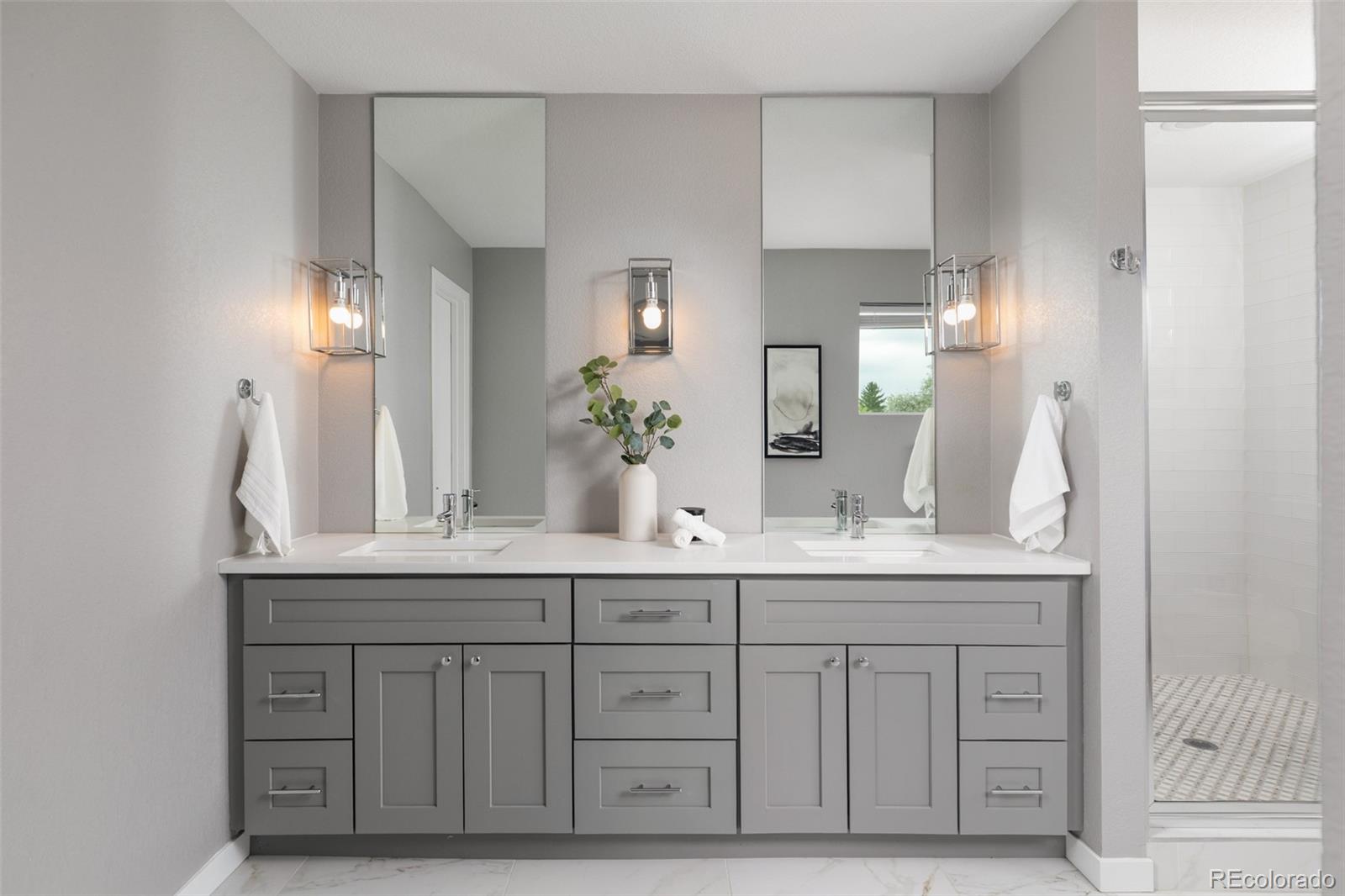 5230 Stuart Street Denver, CO 80212 - Photo 18 of 34 a bathroom with a sink and a mirror