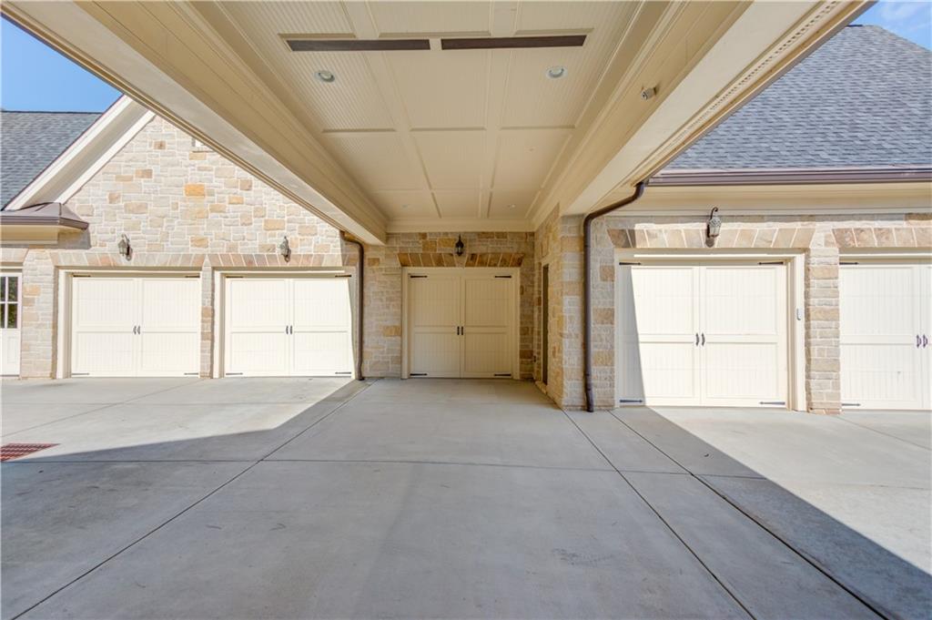 5004 Gunnison Trace Suwanee, GA 30024 - Photo 11 of 108 a view of a big room with wooden floor and windows