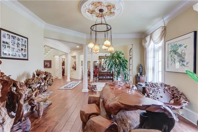 a living room with furniture and a rug