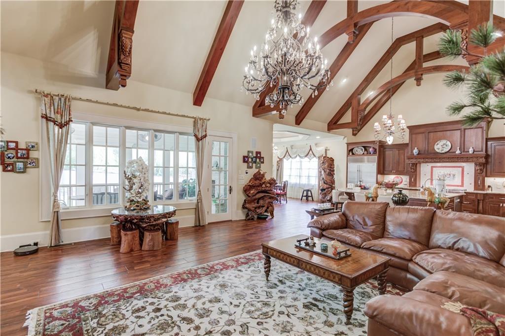 5004 Gunnison Trace Suwanee, GA 30024 - Photo 33 of 108 a living room with furniture and wooden floor