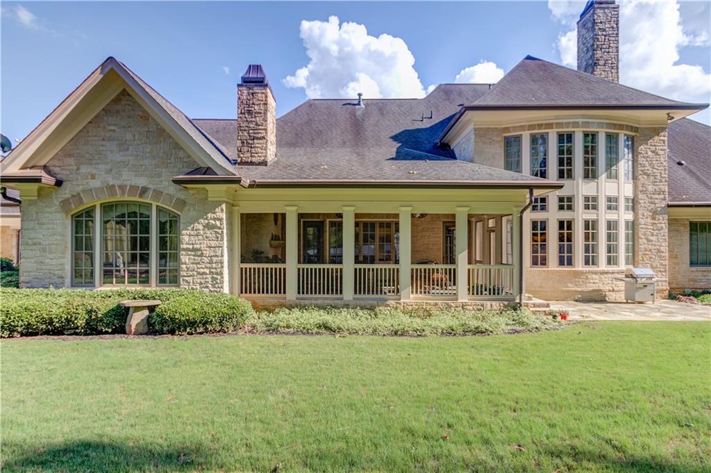 5004 Gunnison Trace Suwanee, GA 30024 - Photo 97 of 108 front view of a house with a yard