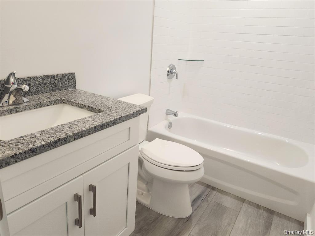 510 Neighborhood Road Shirley, NY 11967 - Photo 9 of 18 1st Floor Full Bathroom with Subway Tile