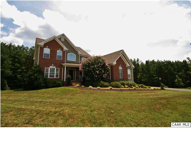 79 Ridgeview Drive Ruckersville, VA 22968 - Photo 1 of 29 a view of a brick house with a yard