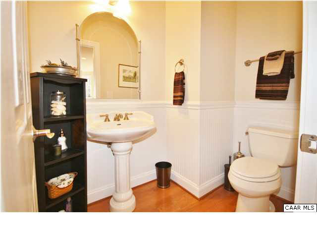 79 Ridgeview Drive Ruckersville, VA 22968 - Photo 12 of 29 a bathroom with a toilet a sink and mirror
