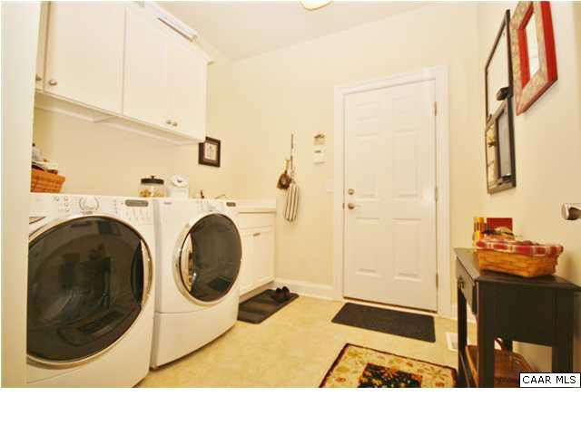 79 Ridgeview Drive Ruckersville, VA 22968 - Photo 24 of 29 a bathroom with a sink and a washing machine