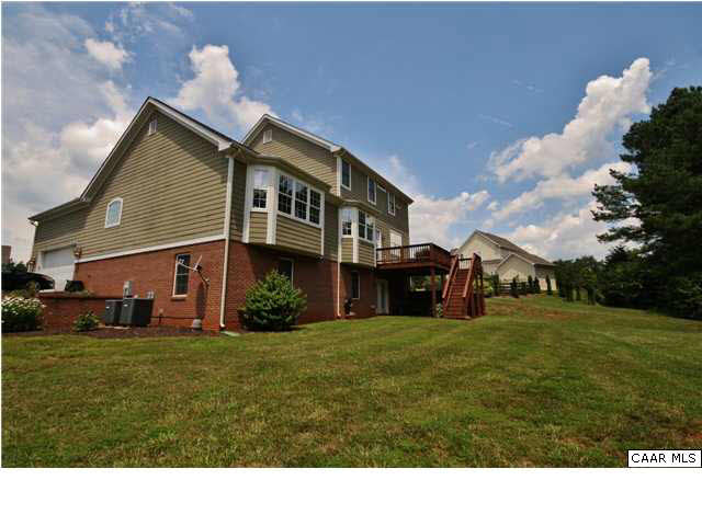 79 Ridgeview Drive Ruckersville, VA 22968 - Photo 26 of 29 a black and white house with a yard