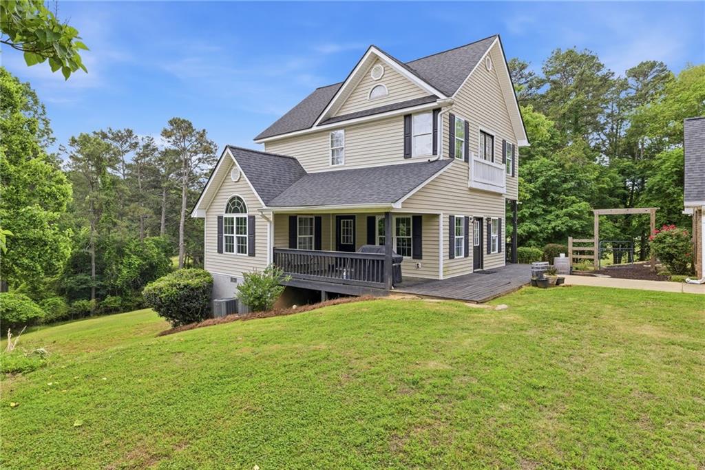 4337 Mountain View Road Oakwood, GA 30566 - Photo 48 of 84 a front view of a house with yard and green space