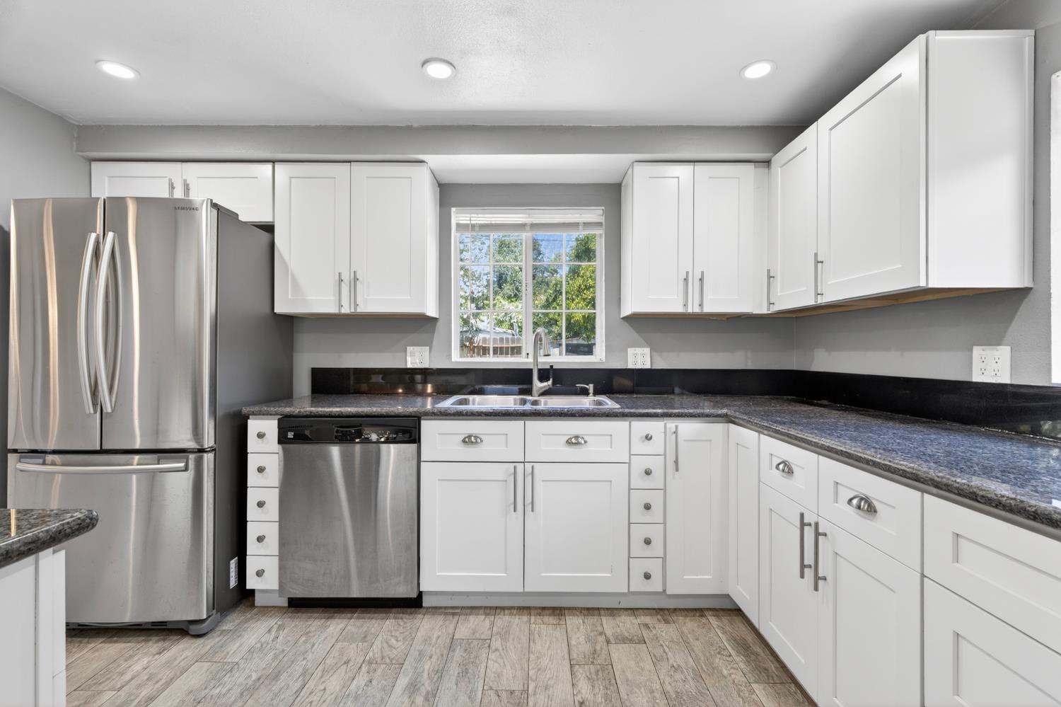 1921 Calhoun Way Stockton, CA 95207 - Photo 12 of 35 Recessed lights plus natural light!