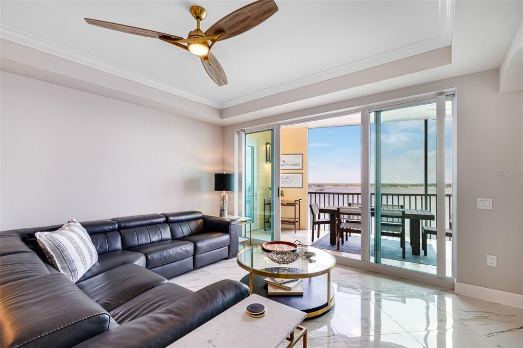 2745 First Street, Unit 1402 Fort Myers, FL 33916 - Photo 11 of 43 a living room with furniture and a window