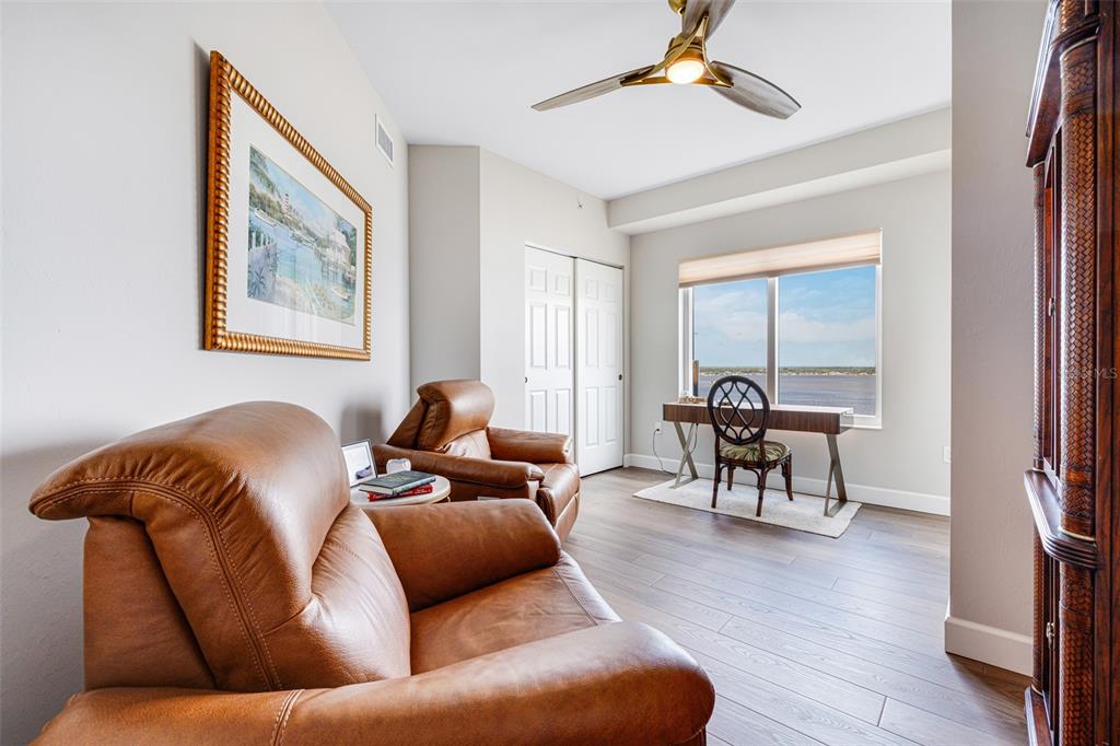 2745 First Street, Unit 1402 Fort Myers, FL 33916 - Photo 22 of 43 a living room with furniture and a window