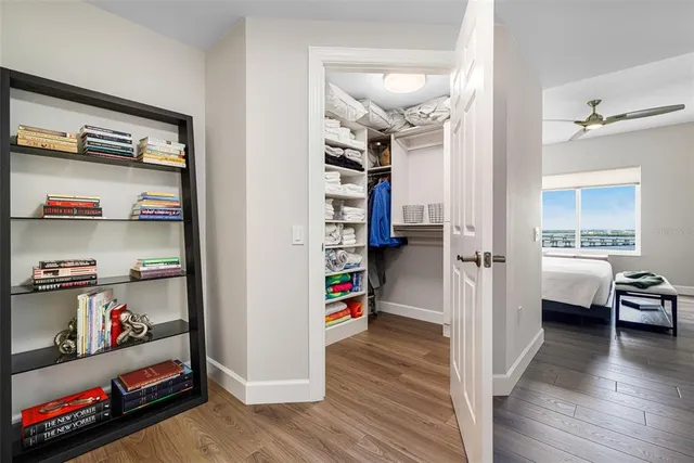 a view of a livingroom with wooden floor and closet