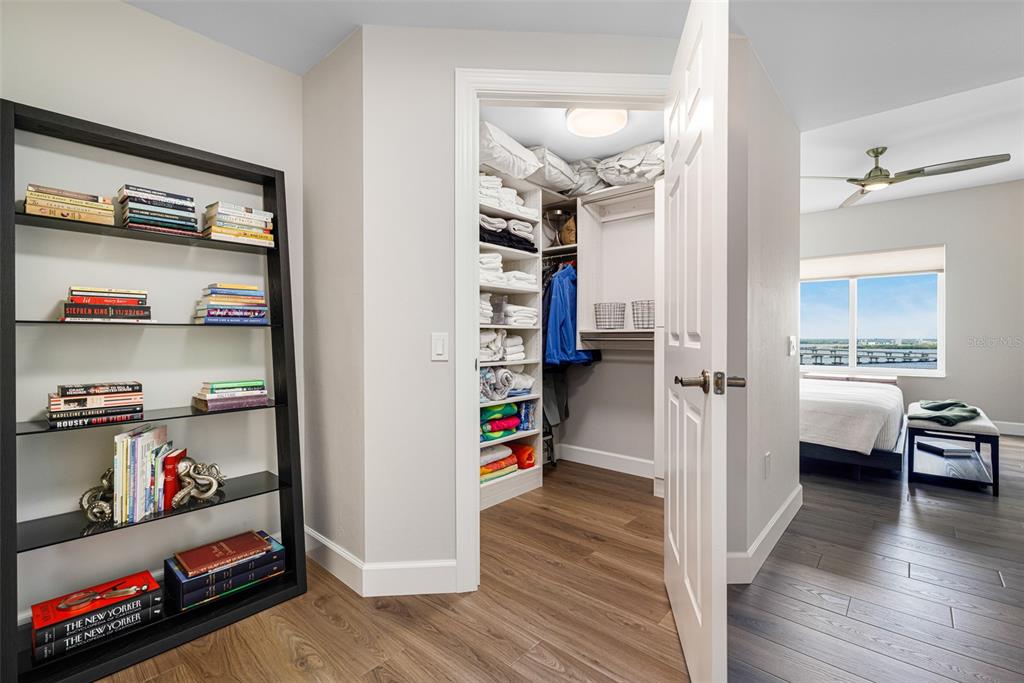 2745 First Street, Unit 1402 Fort Myers, FL 33916 - Photo 27 of 43 a view of a livingroom with wooden floor and closet