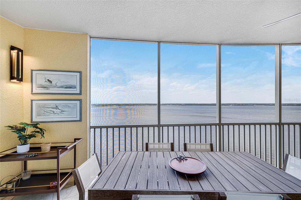 2745 First Street, Unit 1402 Fort Myers, FL 33916 - Photo 30 of 43 a view of a balcony with chairs
