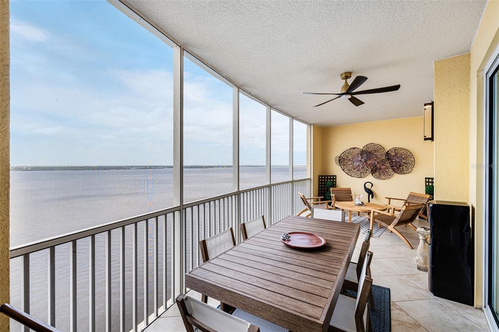 2745 First Street, Unit 1402 Fort Myers, FL 33916 - Photo 31 of 43 a view of a dining room with furniture window and wooden floor