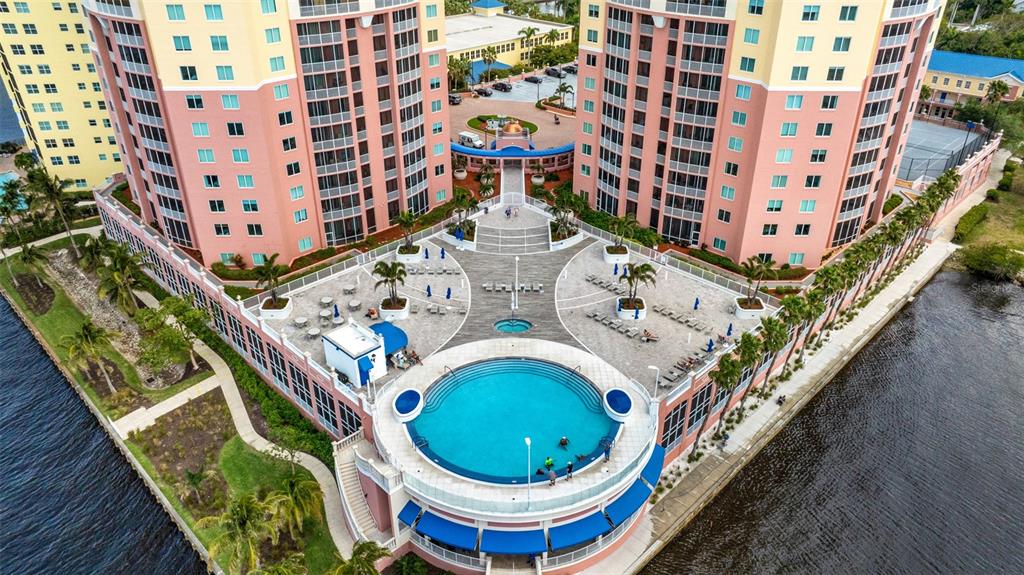 2745 First Street, Unit 1402 Fort Myers, FL 33916 - Photo 41 of 43 a building view with sitting space and garden view