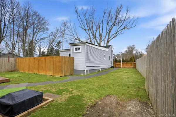 $449,000 | 36 Edgewater Drive, Mastic Beach, NY 11951