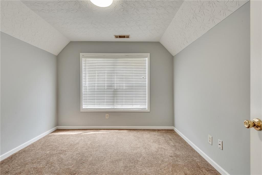 3337 Baymount Way Lawrenceville, GA 30043 - Photo 38 of 47 an empty room with a window