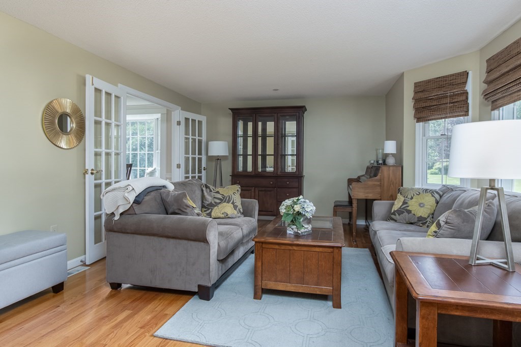 19 Hammond Farm Road Haverhill, MA 01832 - Photo 16 of 42 a living room with furniture and a window