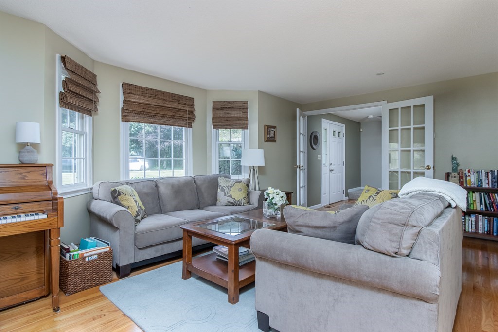 19 Hammond Farm Road Haverhill, MA 01832 - Photo 17 of 42 a living room with furniture and a large window