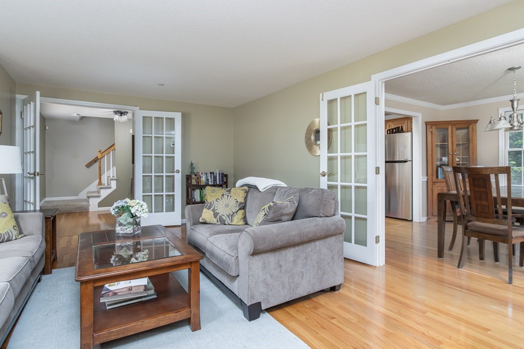 19 Hammond Farm Road Haverhill, MA 01832 - Photo 18 of 42 a living room with furniture and a table