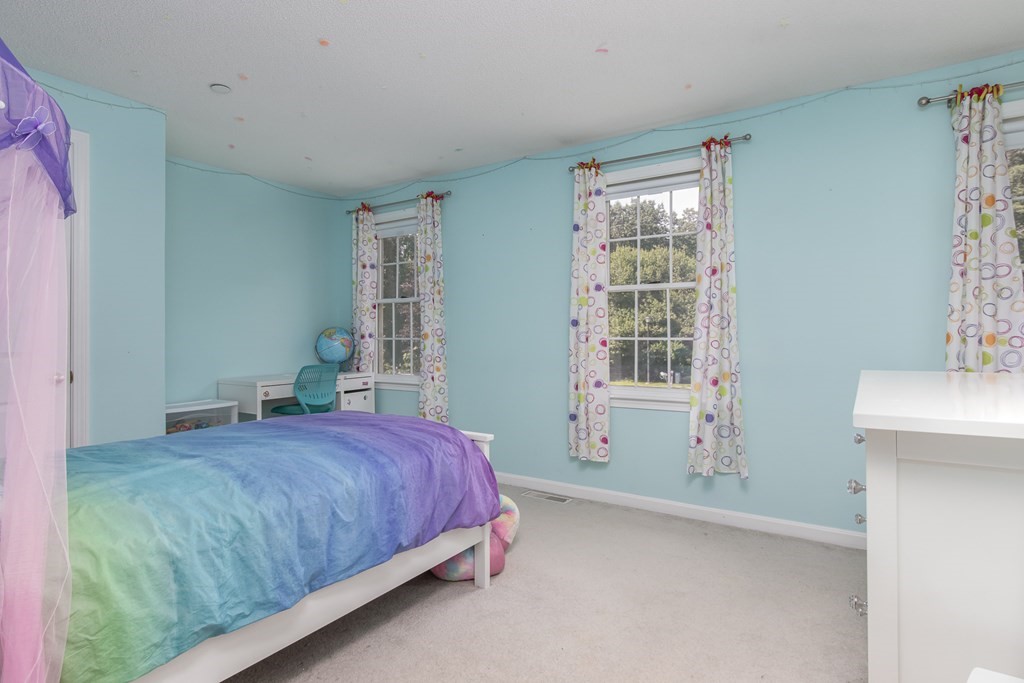 19 Hammond Farm Road Haverhill, MA 01832 - Photo 23 of 42 a bedroom with a bed and a window